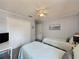 Comfortable bedroom featuring two twin beds, closet and soft carpet, providing ample storage and a serene retreat at 2408 Saint Augustine Blvd, Haines City, FL 33844