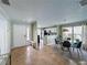 Bright entryway showcasing tiled flooring and a view into the dining area and kitchen at 2408 Saint Augustine Blvd, Haines City, FL 33844