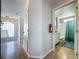 Hallway offers easy access to the bathroom and other living spaces at 2408 Saint Augustine Blvd, Haines City, FL 33844
