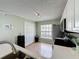 Well-equipped kitchen with ample storage, stainless appliances, and a bright, airy atmosphere at 2408 Saint Augustine Blvd, Haines City, FL 33844