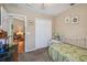 Comfortable bedroom featuring a closet and soothing decor at 247 Bell Tower Xing W, Poinciana, FL 34759