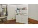 Functional garage area with washer, dryer, and organized storage shelving at 247 Bell Tower Xing W, Poinciana, FL 34759
