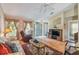 Spacious living room featuring comfortable seating and hardwood floors at 247 Bell Tower Xing W, Poinciana, FL 34759
