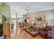 Bright and airy living room with open layout and vaulted ceilings at 247 Bell Tower Xing W, Poinciana, FL 34759