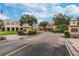 Charming village center entrance with decorative signage, beautiful buildings, and a welcoming atmosphere at 247 Bell Tower Xing W, Poinciana, FL 34759