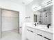 Modern bathroom featuring double vanity, white cabinets and quartz counters at 2639 Sw 162Nd Street Rd, Ocala, FL 34473