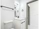 Modern bathroom with white cabinets, black hardware, and sleek fixtures at 2639 Sw 162Nd Street Rd, Ocala, FL 34473