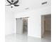 Bright bedroom showcases a glass shower and an entry door, creating an open concept at 2639 Sw 162Nd Street Rd, Ocala, FL 34473