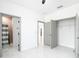 Bright bedroom with tiled flooring and access to bathroom and closet space at 2639 Sw 162Nd Street Rd, Ocala, FL 34473