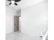 Bright bedroom with ceiling fan and entry into ensuite bathroom at 2639 Sw 162Nd Street Rd, Ocala, FL 34473