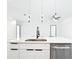 Modern kitchen island with pendant lights and stainless steel appliances at 2639 Sw 162Nd Street Rd, Ocala, FL 34473