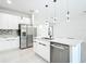 Contemporary kitchen with a center island, stainless steel appliances, and modern fixtures for a sleek and functional space at 2639 Sw 162Nd Street Rd, Ocala, FL 34473