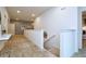 Upstairs hallway with carpeted floor, neutral walls, and recessed lighting leading to bedrooms and other living spaces at 2649 Calistoga Ave, Kissimmee, FL 34741