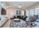Stylish living room featuring modern decor, comfortable seating, and plenty of natural light at 2649 Calistoga Ave, Kissimmee, FL 34741