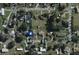 Aerial view of neighborhood, showing the layout with surrounding streets and properties at 2947 Larson St, Kissimmee, FL 34741