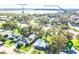 Aerial view of the property showing the surrounding landscape and nearby Lake Tohopekaliga at 302 E Drury Ave, Kissimmee, FL 34744