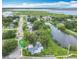 Aerial view of the home with pond and lake nearby at 302 E Drury Ave, Kissimmee, FL 34744