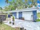 Exterior of the shed offering additional storage space, featuring a well-maintained yard and charming details at 302 E Drury Ave, Kissimmee, FL 34744