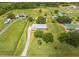 Spacious home on a large lot with manicured lawns and mature trees creating a private oasis at 3048 Cherokee Rd, St Cloud, FL 34772