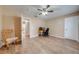 Bedroom with a desk, chair, window, ceiling fan, and hardwood floors at 3048 Cherokee Rd, St Cloud, FL 34772