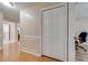 Hallway with decorative trim, access to other rooms, and a closet at 3048 Cherokee Rd, St Cloud, FL 34772