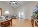 Comfortable living room features vaulted ceilings, hardwood floors and a large sectional sofa at 3048 Cherokee Rd, St Cloud, FL 34772