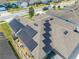 Aerial view of roof with solar panels, skylights, and gutter system at 3101 Drema Dr, St Cloud, FL 34769