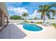 Outdoor pool with manicured backyard offering a private oasis for relaxation and entertaining at 3101 Drema Dr, St Cloud, FL 34769