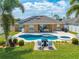 Outdoor pool and patio with seating and landscaping, enhancing outdoor living and relaxation at 3101 Drema Dr, St Cloud, FL 34769