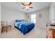 Bright bedroom with a ceiling fan and neutral carpet at 3101 Drema Dr, St Cloud, FL 34769