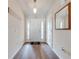 Welcoming entryway with wood-look tile flooring and a clear view to the main room at 3101 Drema Dr, St Cloud, FL 34769