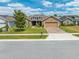 Charming single-Gathering home with a two car garage, manicured lawn, and inviting curb appeal at 3101 Drema Dr, St Cloud, FL 34769