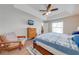 Spacious main bedroom featuring tray ceilings and an attached bathroom at 3101 Drema Dr, St Cloud, FL 34769