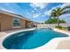 Sparkling pool with an adjacent patio area, ideal for relaxing and enjoying the outdoors at 3101 Drema Dr, St Cloud, FL 34769