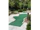 Community mini golf course amid lush landscaping at 313 Captiva Dr, Davenport, FL 33896