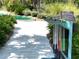 A mini golf course at a residential property includes clubs and official rules at 313 Captiva Dr, Davenport, FL 33896