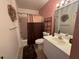 Bathroom with tub and shower, sink, vanity, and decorative accents at 344 Winter Ridge Blvd # 344, Winter Haven, FL 33881