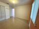 Bedroom featuring tile flooring and natural light coming in from a window at 344 Winter Ridge Blvd # 344, Winter Haven, FL 33881