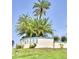 Entrance to Winter Ridge community with lush landscaping and clear signage at 344 Winter Ridge Blvd # 344, Winter Haven, FL 33881