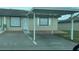 Cozy single-story home featuring a covered carport and neatly paved front entrance at 344 Winter Ridge Blvd # 344, Winter Haven, FL 33881