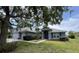 Charming single-story home with well-maintained landscaping and inviting curb appeal at 3638 Doe Run Dr, St Cloud, FL 34772