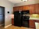 Modern kitchen equipped with stainless steel appliances and ample counter space at 3638 Doe Run Dr, St Cloud, FL 34772