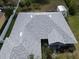 Aerial shot showcases the newly installed gray roof with bright white skylights at 3638 Doe Run Dr, St Cloud, FL 34772