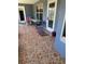 Screened patio with furniture and tile flooring at 3638 Doe Run Dr, St Cloud, FL 34772