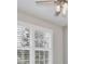Bedroom featuring white blinds and a ceiling fan with lights at 4327 Silver Creek St, Kissimmee, FL 34744