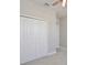 Bedroom featuring a ceiling fan and double door closet at 4327 Silver Creek St, Kissimmee, FL 34744