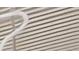 View of a window with white blinds looking to the outside at 4327 Silver Creek St, Kissimmee, FL 34744