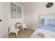 Bedroom with twin bed and corner seating at 4722 Flagler Beach Way, Kissimmee, FL 34746