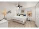 Bright bedroom with natural light, ceiling fan, and white furnishings at 4722 Flagler Beach Way, Kissimmee, FL 34746