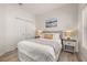 Comfortable bedroom with double closet, natural light, and modern decor at 4722 Flagler Beach Way, Kissimmee, FL 34746